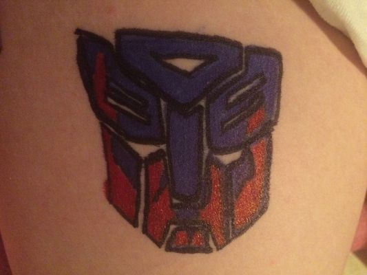 decepticon and autobot logo tattoo